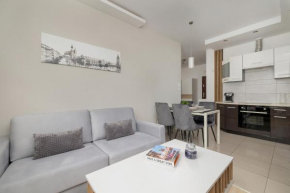 Podgórze Air-Conditioned Family Apartment with Parking by Noclegi Renters